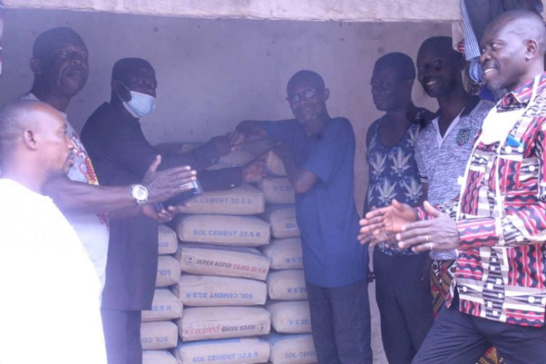 Hon.Joseph Frempong, member of Parliament for Nkawkaw Constituency donated bags of cement to Awenade Anglican Primary school